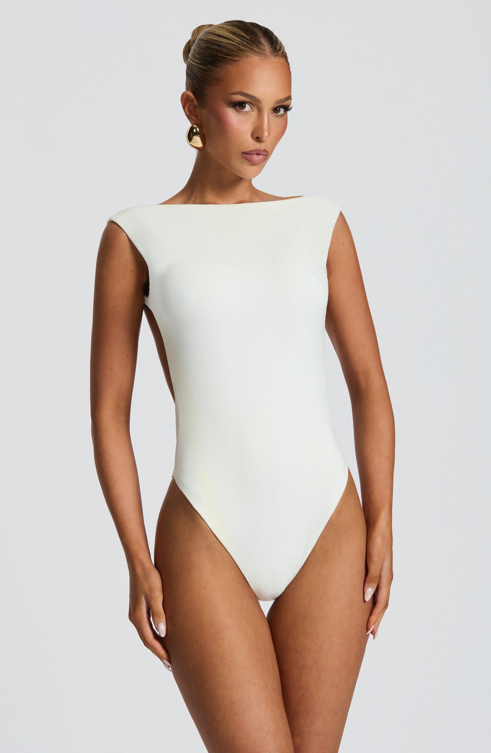 tori-bodysuit-white-bodysuit-babyboo-fashion-1170008726
